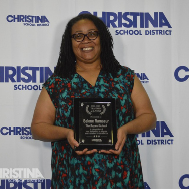 Photo of Selene Ramseur holding award
